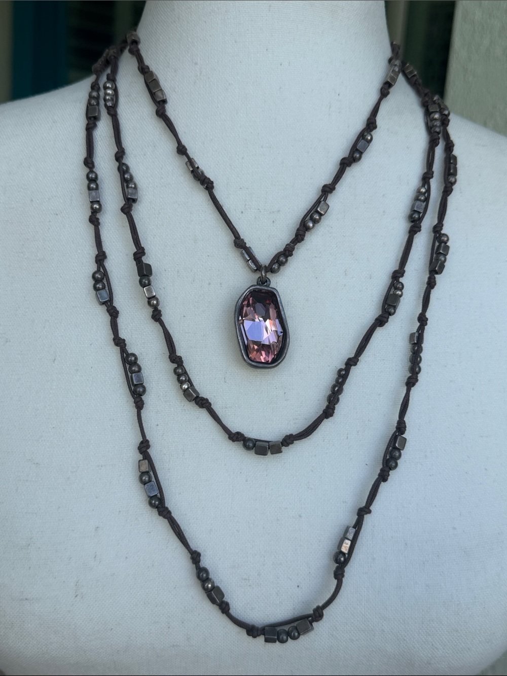Uno de 50 retired triple strand leather and stone necklace